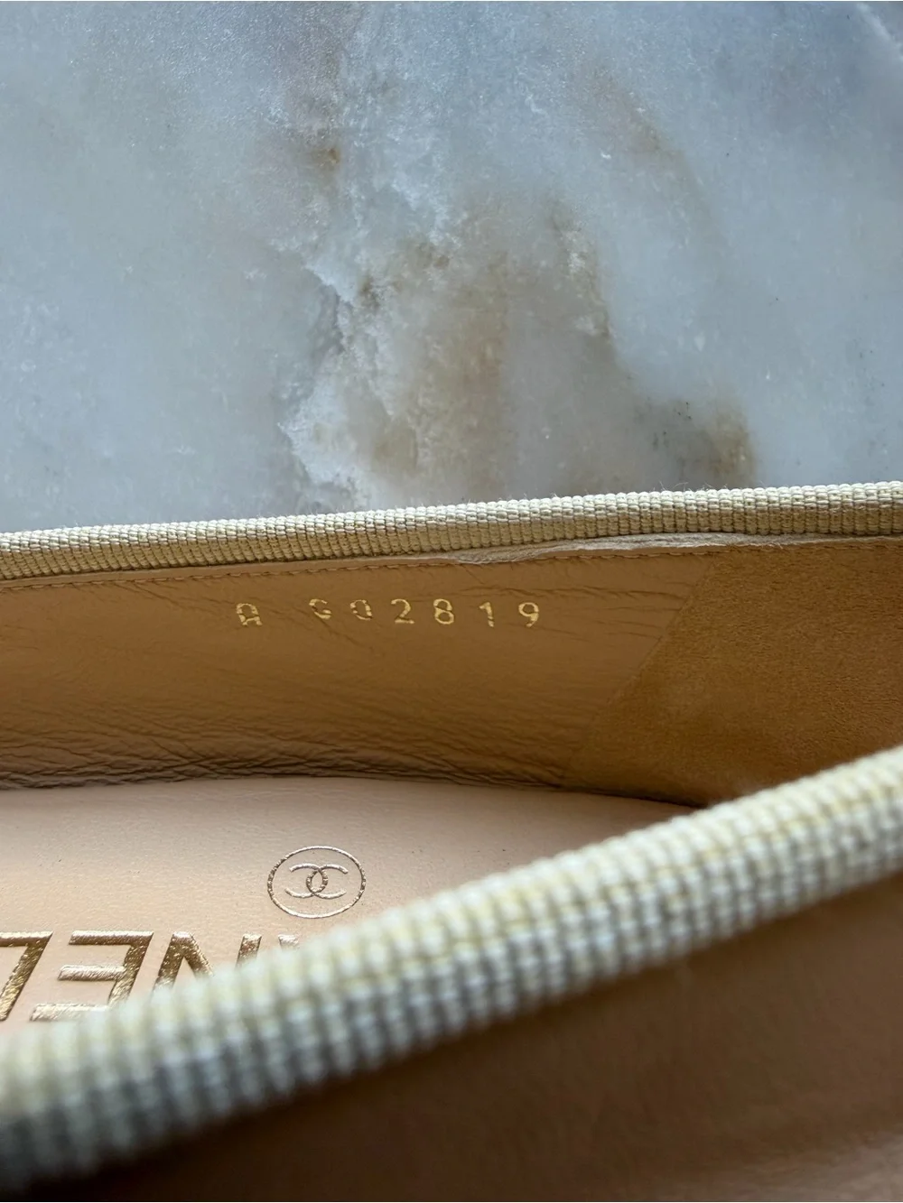CHANEL Beige and Black Leather Cap-Toe Ballet Flats